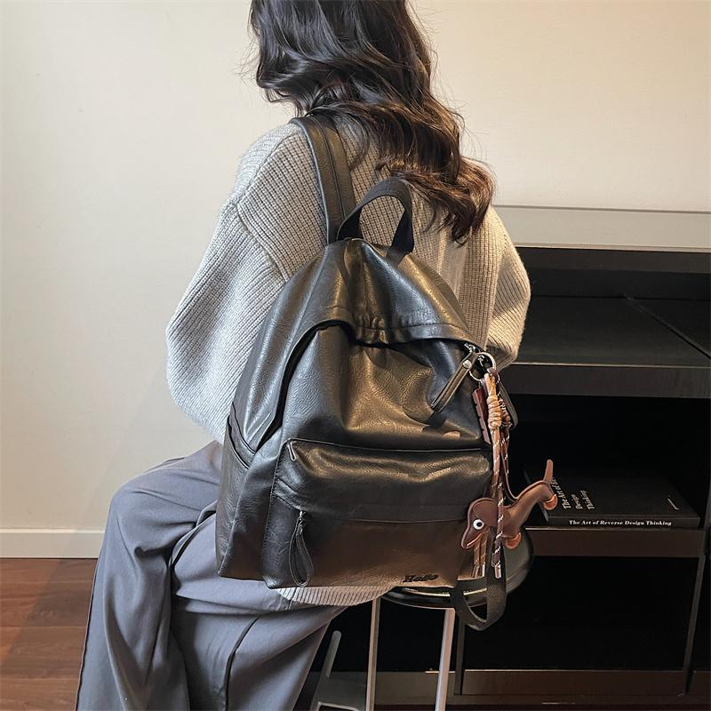 Fashionable PU Leather Backpack with Adjustable Shoulder Straps Simple Design Suitable for Daily Use Travel Shopping and Other Scenarios No Pendant