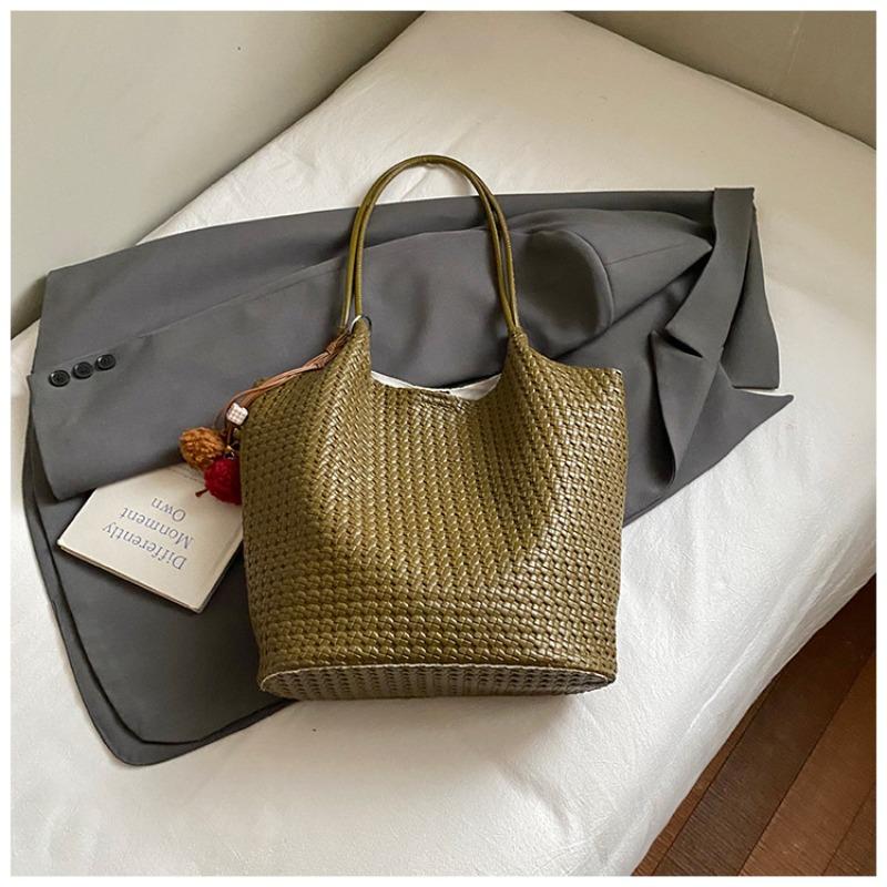 Autumn new texture braided pattern commuting simple large capacity retro solid color bucket armpit shoulder bag for women