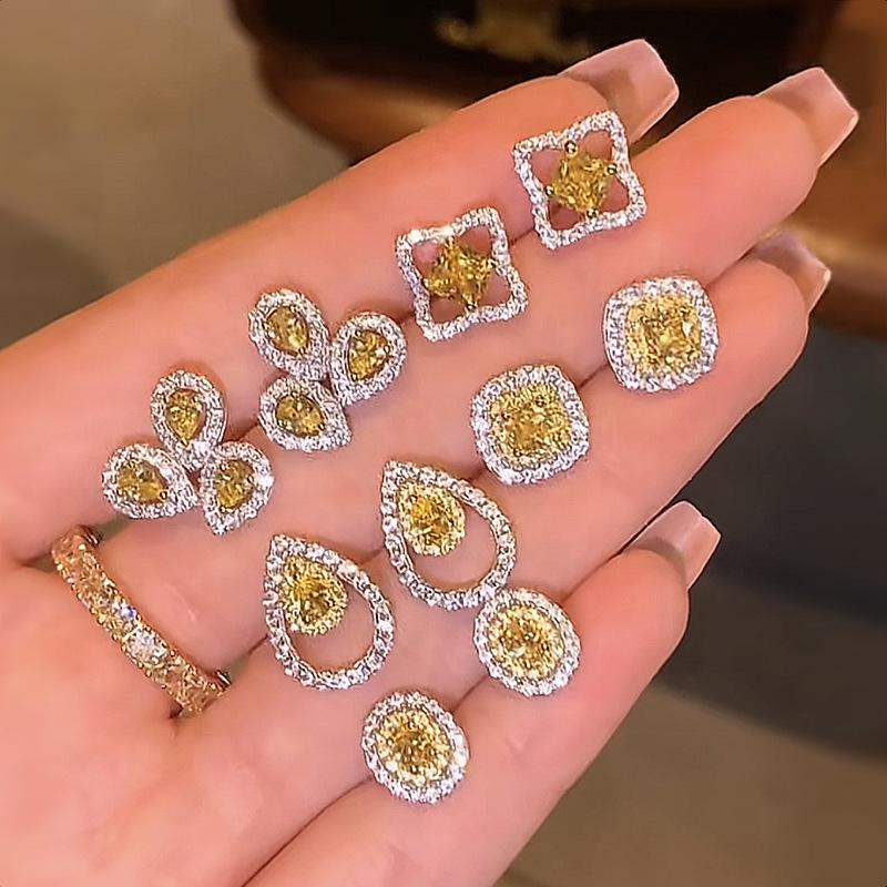 

Lulu Tong Luxurious 2023 S925 Sterling Silver Channel-Style Yellow Diamond Stud Earrings S925 Silver