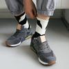 1 Par Kvinder Mænd Mellemlange Sportsstrømper Asymmetriske Stribede Hip Hop Stil Skateboard Åndbare Høj Elastiske Parstrømper