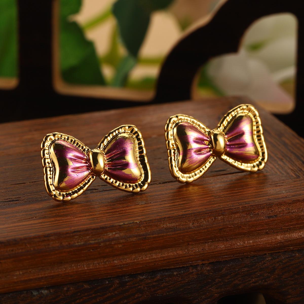 

S925 silver needle bow painted medieval earrings niche design sense natural freshwater pearl