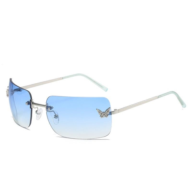 Personalized trend frameless sunglasses women's European and American fashion wear butterfly decorative women sunglasses