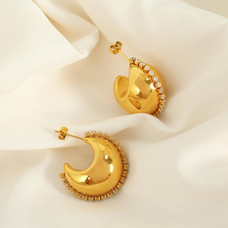 Europäische und amerikanische personalisierte Titanstahl einreihige Zirkon-beschichtete 18K hohle Wassertropfenohrringe Pendler