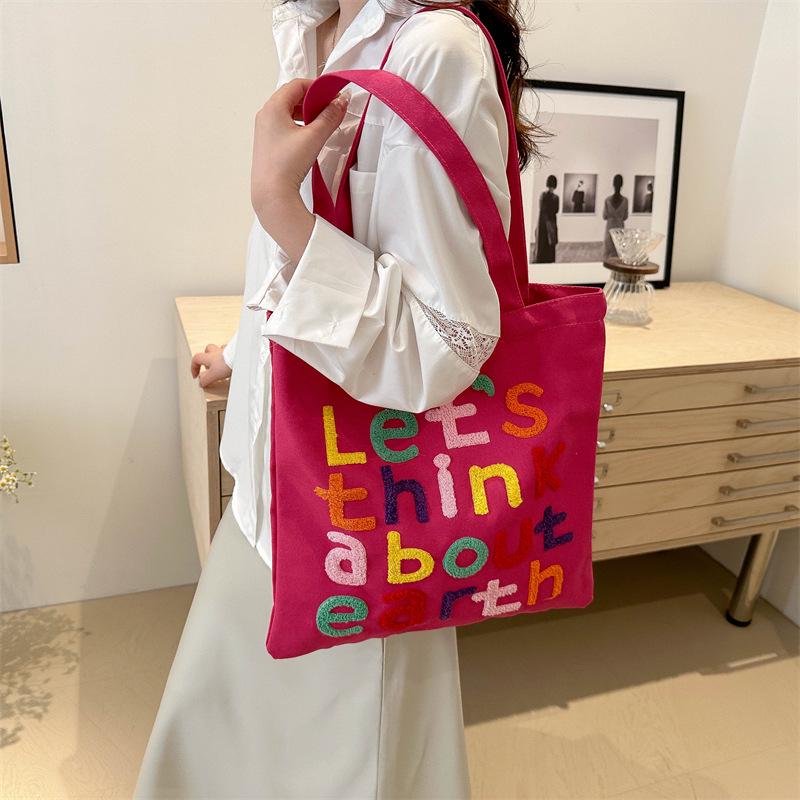 

Кольорова вишита полотняна сумка через плече в корейському стилі для студентів 37*0.5*37 троянди рожеві кольору