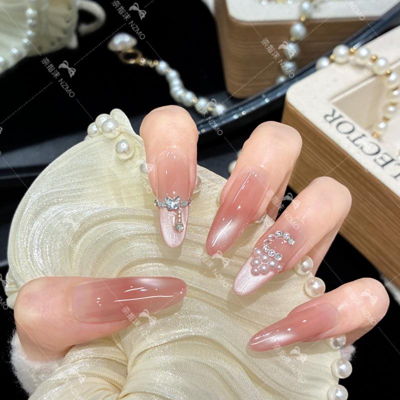 

Nude Pink Cat Eye Nails with Inlaid Diamonds M (Long Oval)