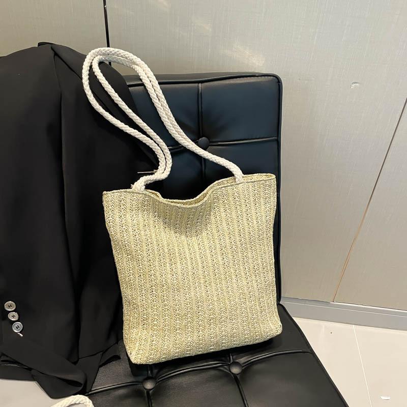

Literary and artistic weaving pastoral style fashion new tote bag women s versatile personality niche leisure large-capacity shoulder bag хаки