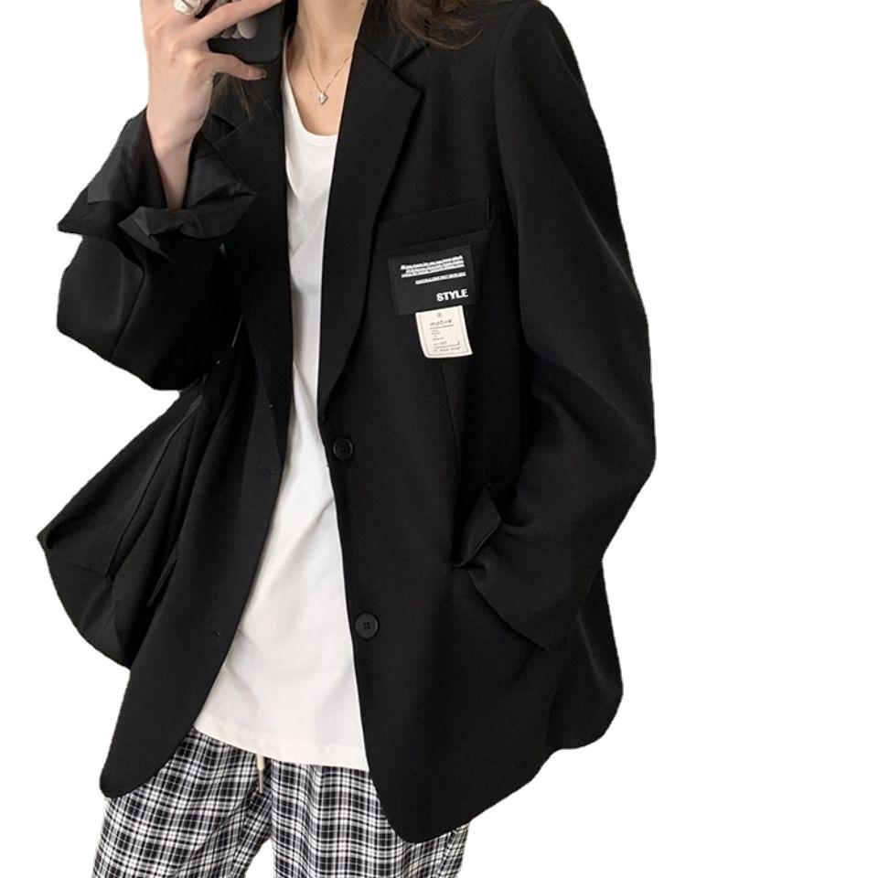 Manteau blazer élégant et coupe ample pour femme, parfait pour le streetwear.