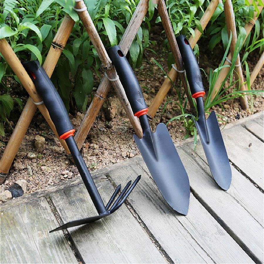 Rastrello a cinque denti con manico in gomma nera, set da quattro pezzi per giardinaggio, pala per fiori, zappa a doppio scopo, attrezzo da giardinaggio