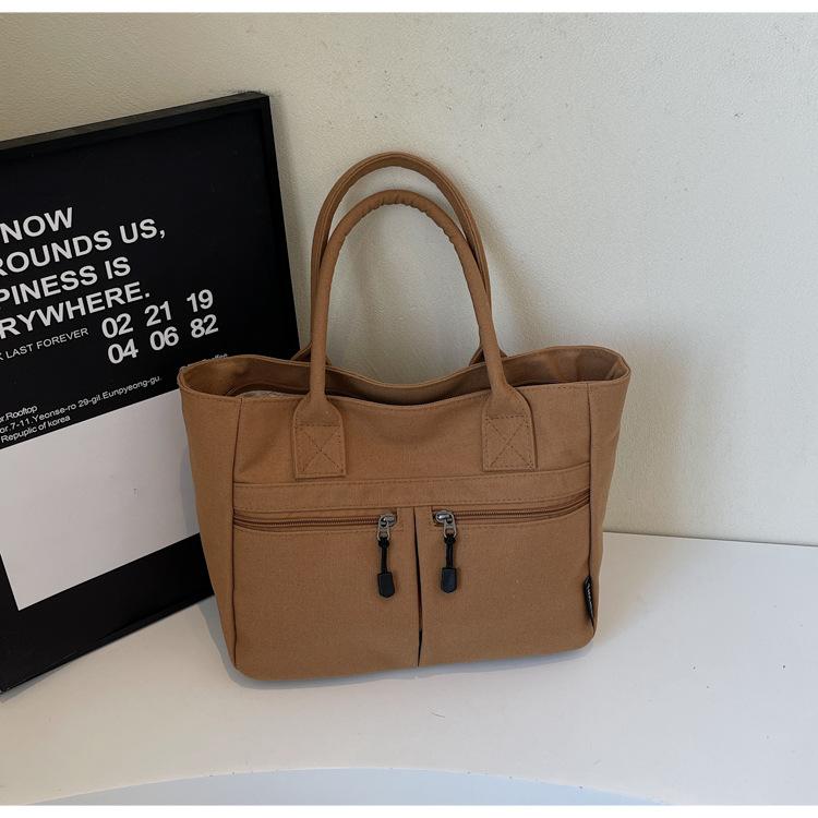 

Ленивый ветер большая вместимость сумка-тоут 2025 новая простая повседневная холщовая сумка однотонная сумка через плечо сумка для通勤 женская сумка