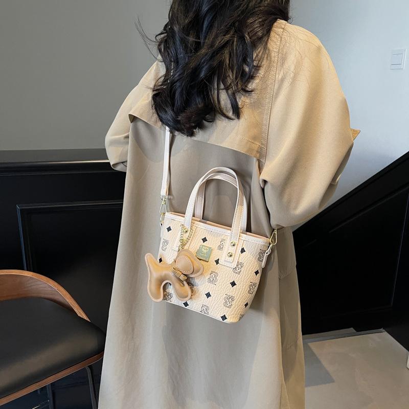 Ieșind geantă mică pentru femei 2025 nouă la modă populară de înaltă calitate geantă de umăr navetistă messenger geantă găleată