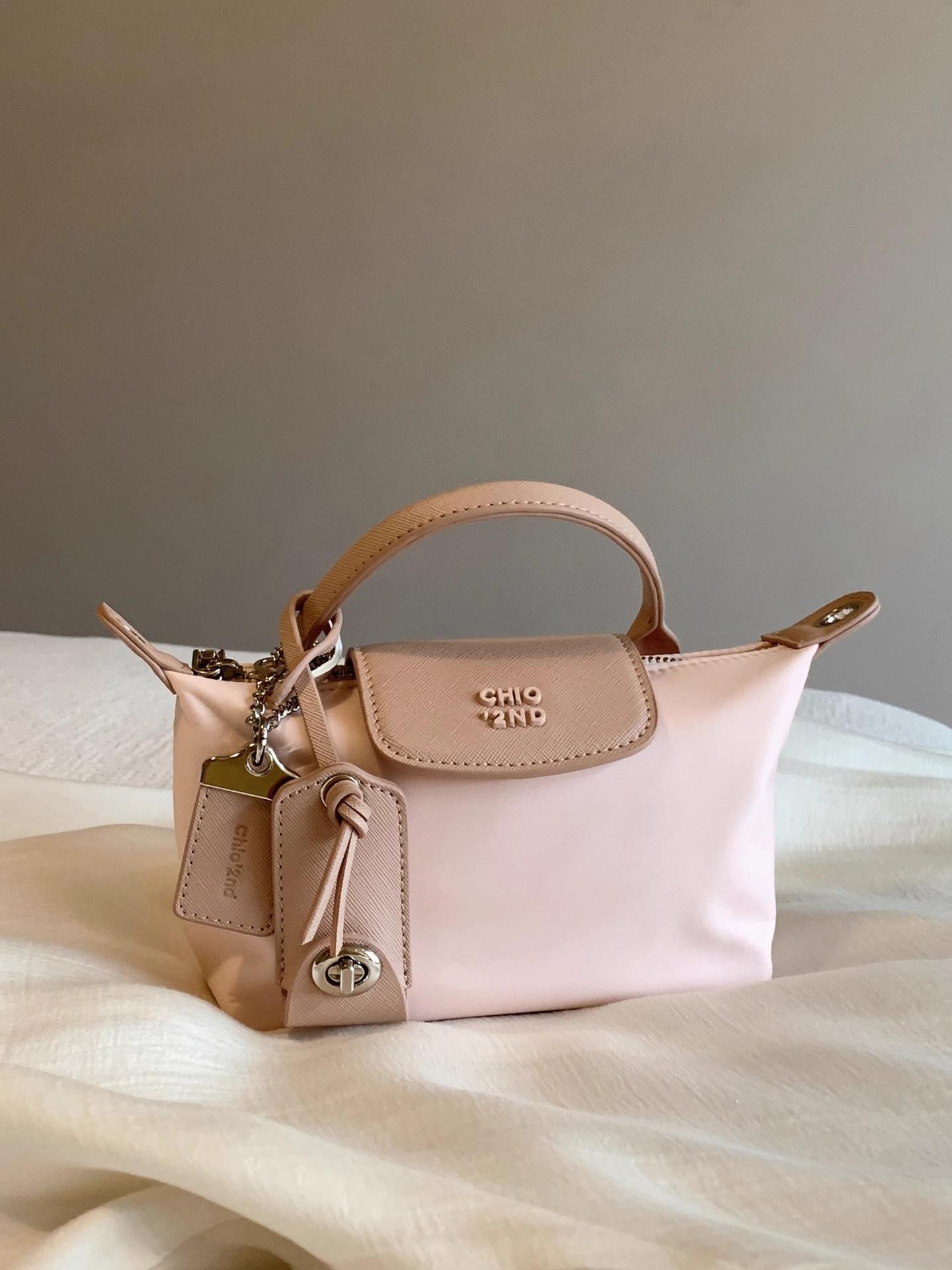 

Жіноча сумка Macaron 2024, новинка весни та літа, приміська сумочка, сумочка через плече рожевий