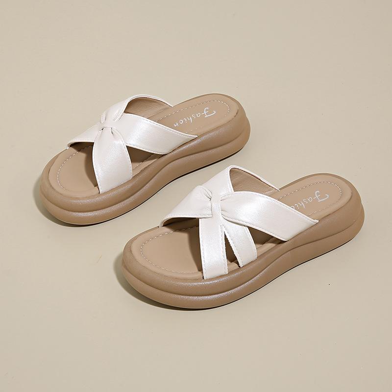 

Лето 2025 новая верхняя одежда сказочный стиль с юбкой толстая подошва пляжные шлепанцы на одной перемычке новые китайские перекрестные крутые шлепанцы женщина 41