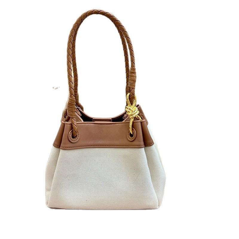 2026 New Cowhide Woven Bag Same Brand Model Hand-carry One-shoulder Cross-body Fashionable Women's Landing Umbrella