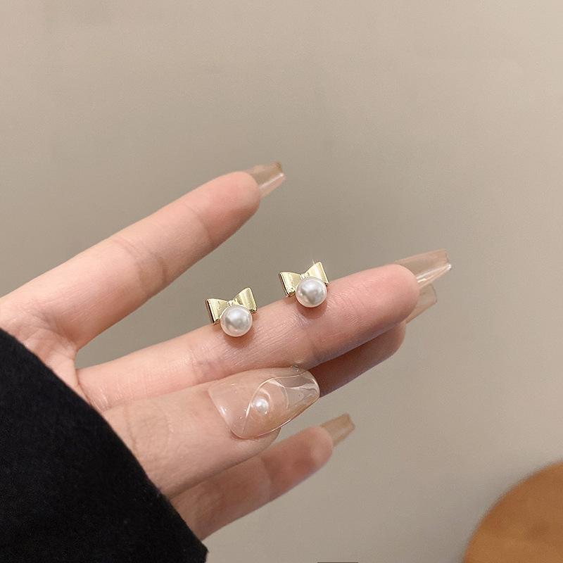 Silver Needle Small Temperament Bow Pearl Stud Earrings Women's Style Simple Personality Earrings Korean Edition Fashion Earrings