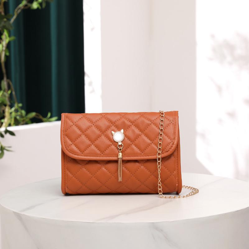 

Sweet and fashionable embroidered rhombus small square bag cat head fringed pendant messenger women s bag mobile phone change bag коричневый