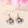 Korean version cute white K water cup black cat ear buckle sweet cute earrings