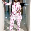 Women Plus Size Two Piece Printed Outfit Irregular Hem Round Neck Three Quarter Sleeve Top Wide Leg Trousers
