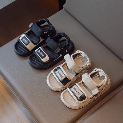 Kindersandalen 2024 Neue Sommerjungen-Strandschuhe mit weicher Sohle und rutschfesten Sohlen für den Urlaub, koreanische Ausgabe, lässig genähte Sandalen