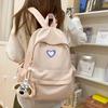 School bags, female college students, simple solid colors, love, junior high student, niche and versatile girls, high school student backpacks, trends