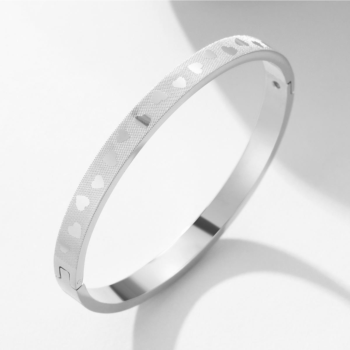 New titanium steel bracelet creative corrosion love pattern pattern buckle couple bracelet stainless steel jewelry