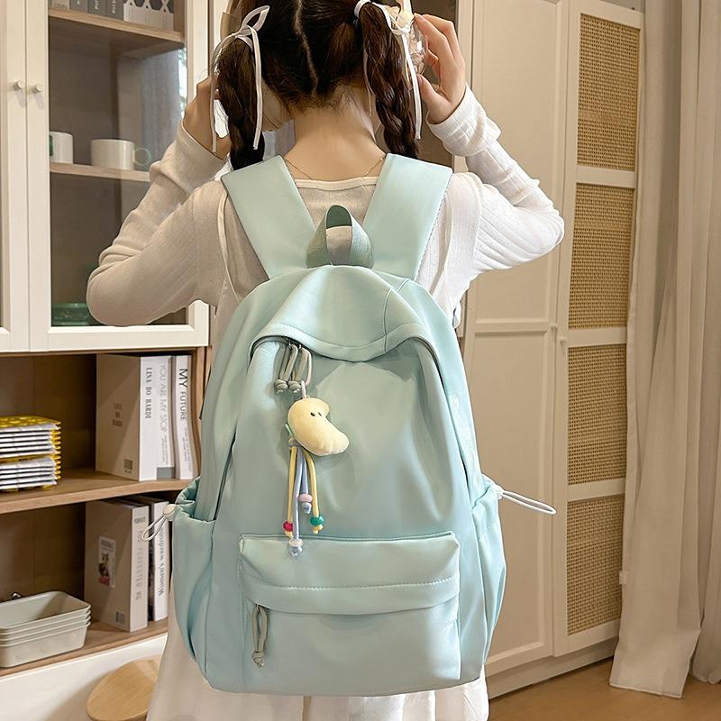 The new simple, fresh, cute, sweet, high-value, versatile, fashionable, lightweight and large-capacity backpack.