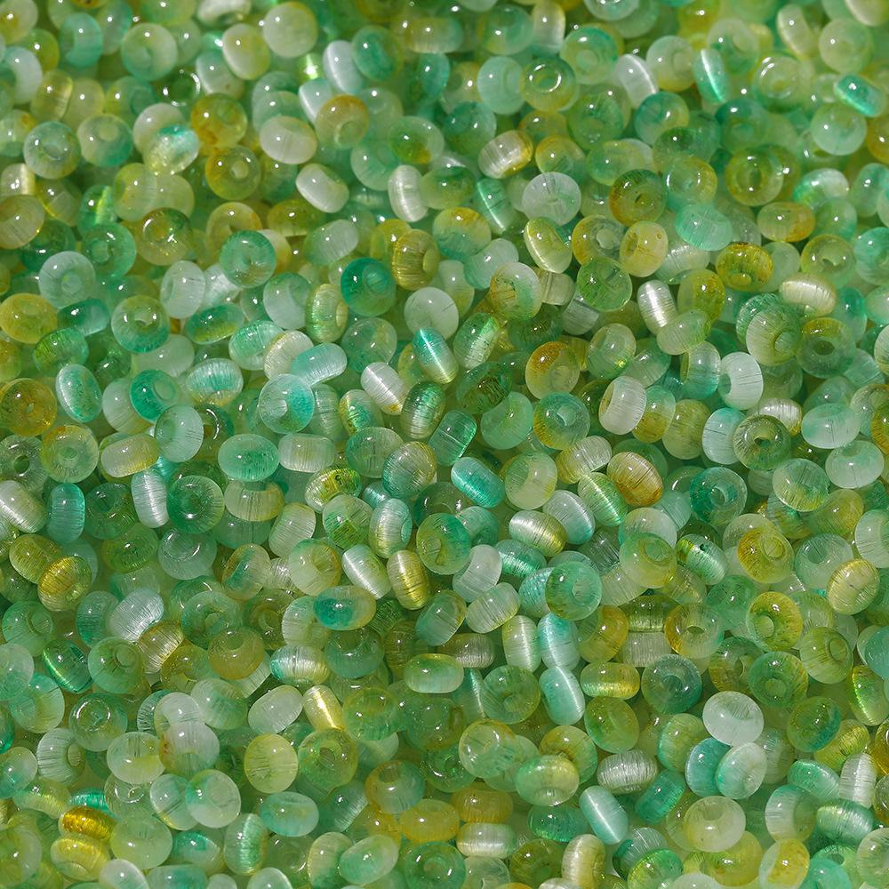 

About 2 * 4mm Glass Two-color Cat s Eye Beads, DIY Bracelet Beaded Jewelry Accessories 100 pcs/bag 2.5 * 4mm/aperture 1.3mm/about 7.5g