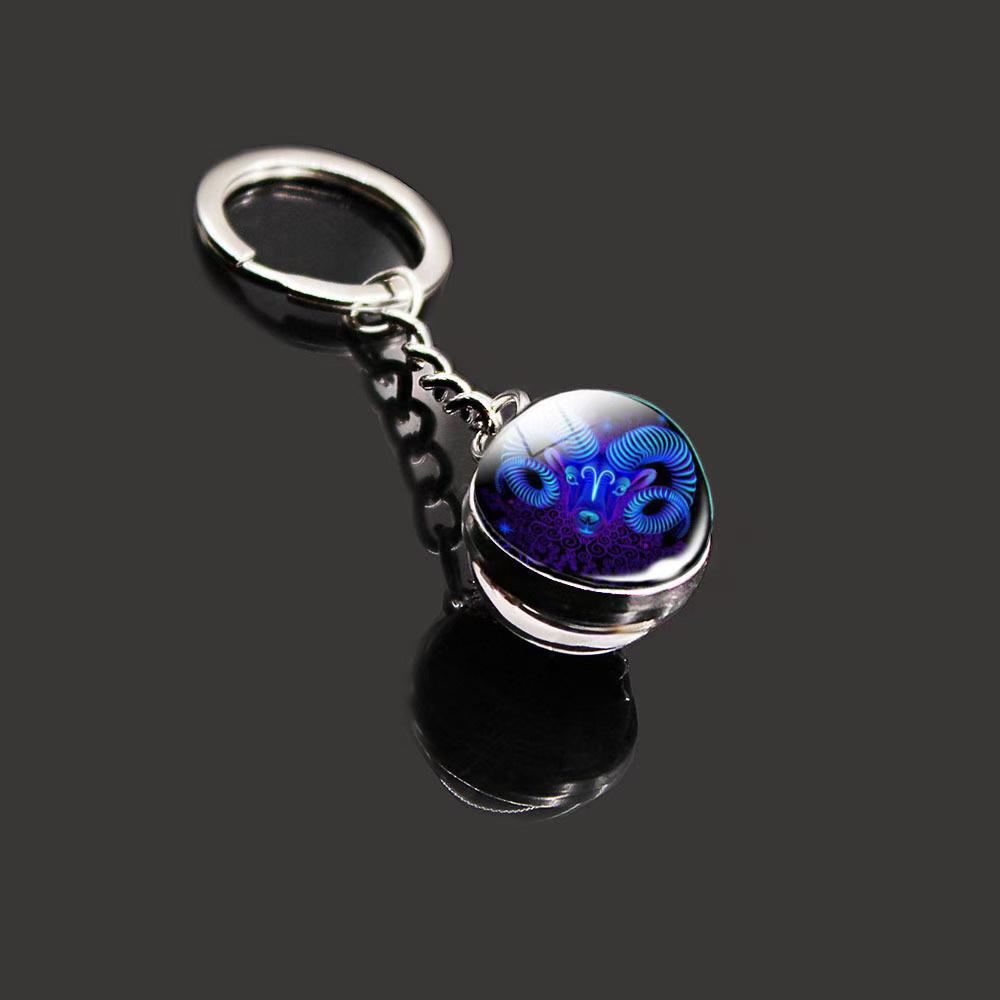 Sferische Lichtgevende Kristal Zodiac Sleutelhanger - Maagd & Leeuw