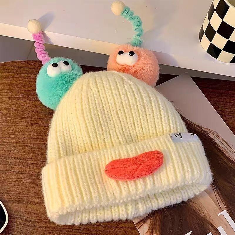 A Knitted Hat with Strange Colors and Novel Styles, Cute Autumn and Winter Children's Wool Ball Hat for Warmth Fun Creativity