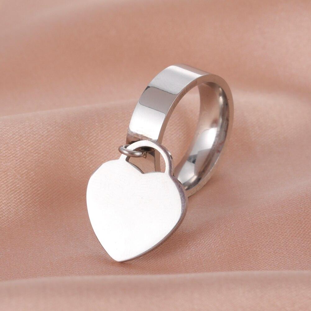 Skyrim New Arrival Stainless Steel Couple Rings With Dangle Heart Pendant Dating Finger Ring Men Voguish Women Stylish Bridal Bridal Lover Jewelry