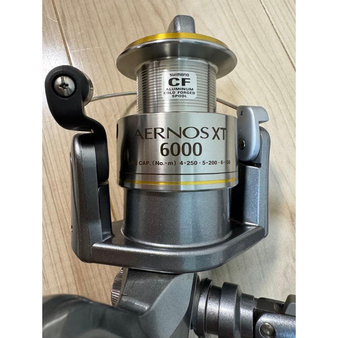 Used Shimano Airos XT 6000 spinning reel Good condition Good operation