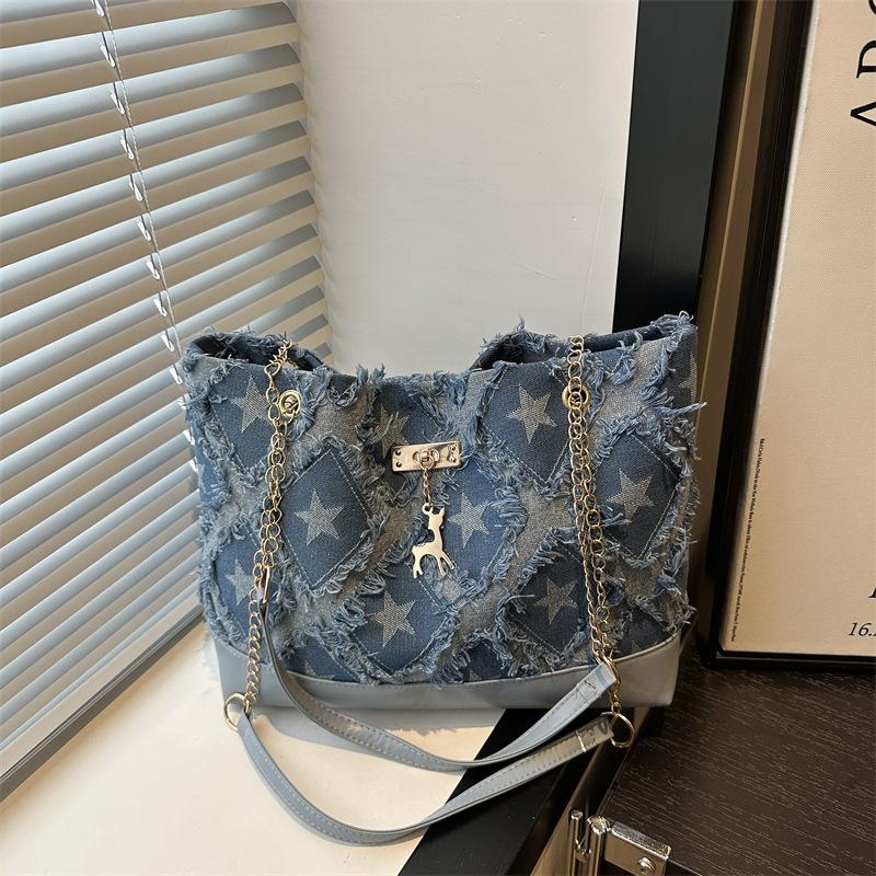 

Denim tote bag women s new portable large-capacity fashion shoulder bag personalized rough edge commuter bag