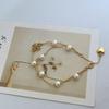 European & American Fashion Luxury Double Layer Bracelet with Rhinestones, Freshwater Pearls, and English Letter Charms for Women