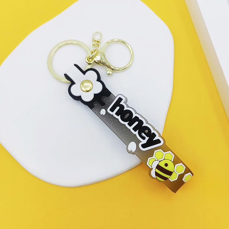 Transparent Pvc Soft Rubber Rope Keychain English Small Flower Jelly Color Plum Blossom Candy Color Drop Adhesive Wristband