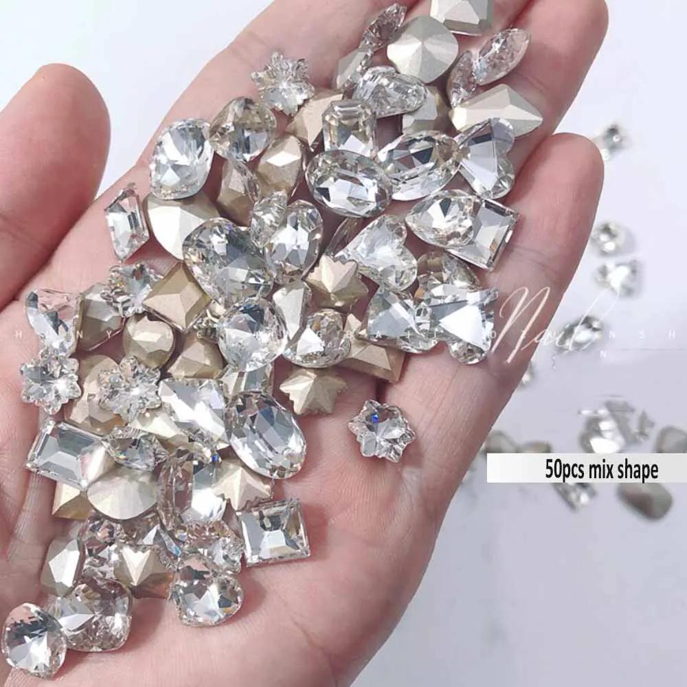 50 szt. 3D K9 Błyszczące Białe Kryształowe Rhinestone'y do Zdobienia Paznokci Mieszane Kształty Szpic na Dole Szklane Diamenty Charmsy do Paznokci Akcesoria do Paznokci DIY