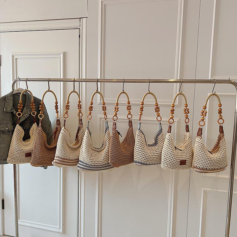 Holiday style woven bag women's 2025 new knitted hollow shoulder bag fashionable large-capacity messenger bag beach bag