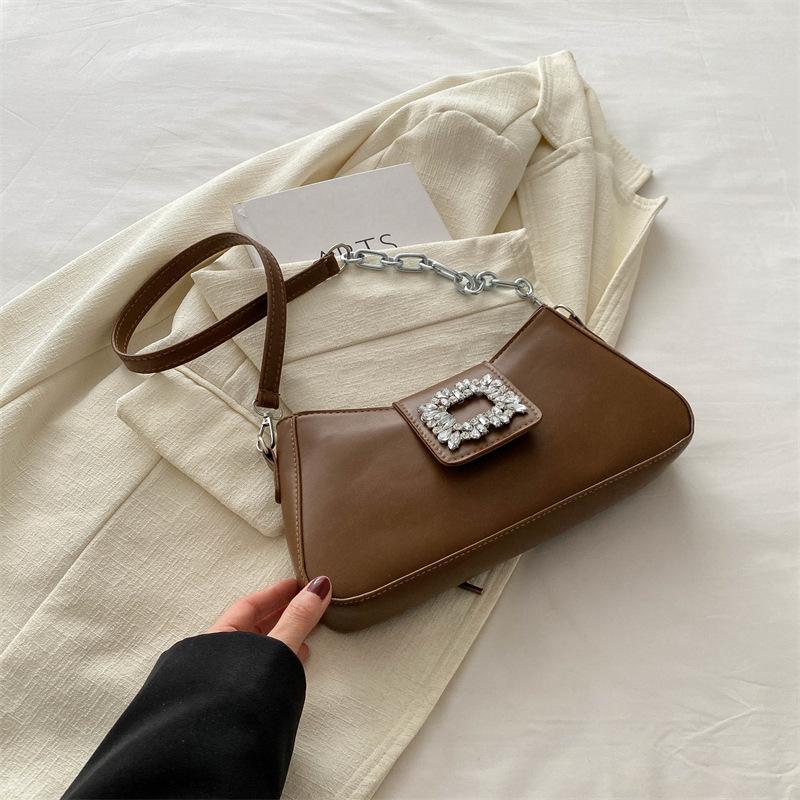 

Літо 2024, нова нішева текстурна сумка-багет, проста повсякденна сумка через плече, модна жіноча сумка під пахвами