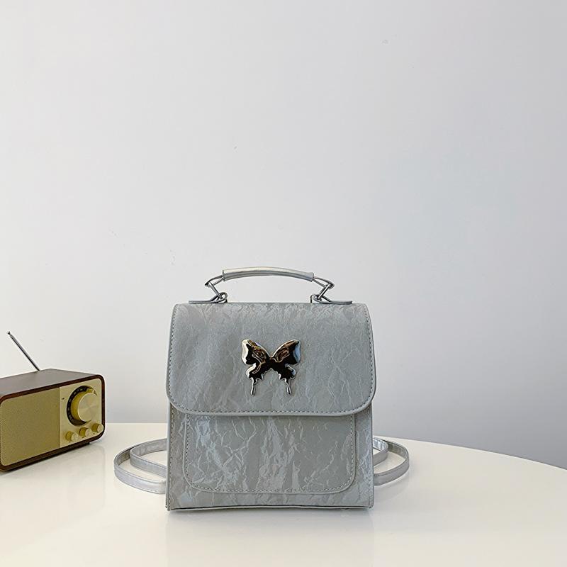 

Темперамент простая модная сумка 2025 весна и лето дизайн универсальный рюкзак квадратная сумка женская серебряный