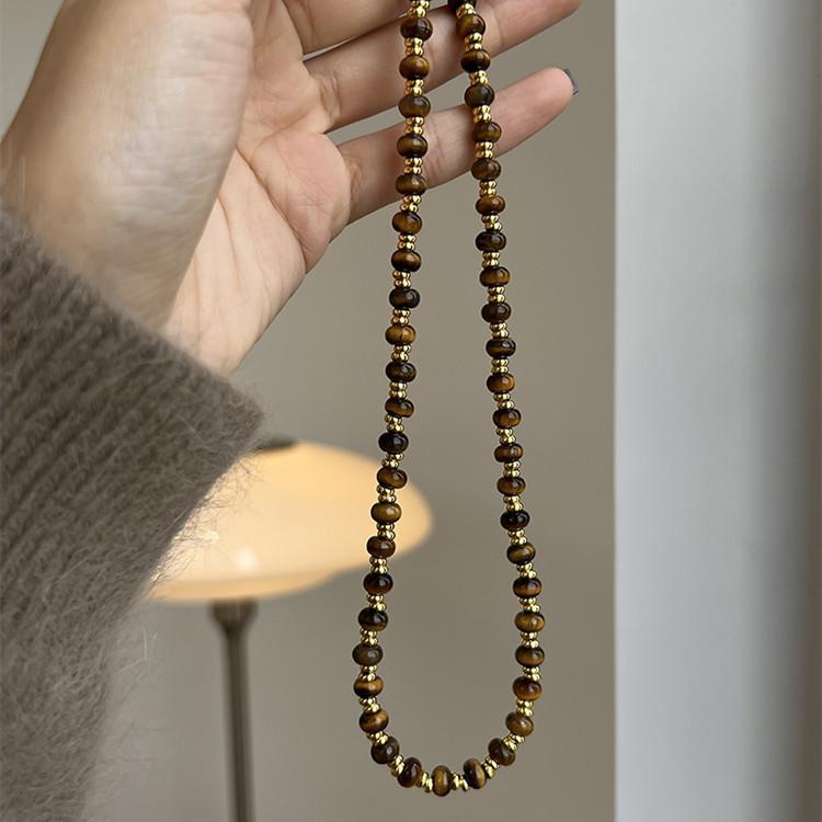 

Осенне-зимняя женская мода Легкая роскошь Нишевая индивидуальность Многослойное бусинное ожерелье long style