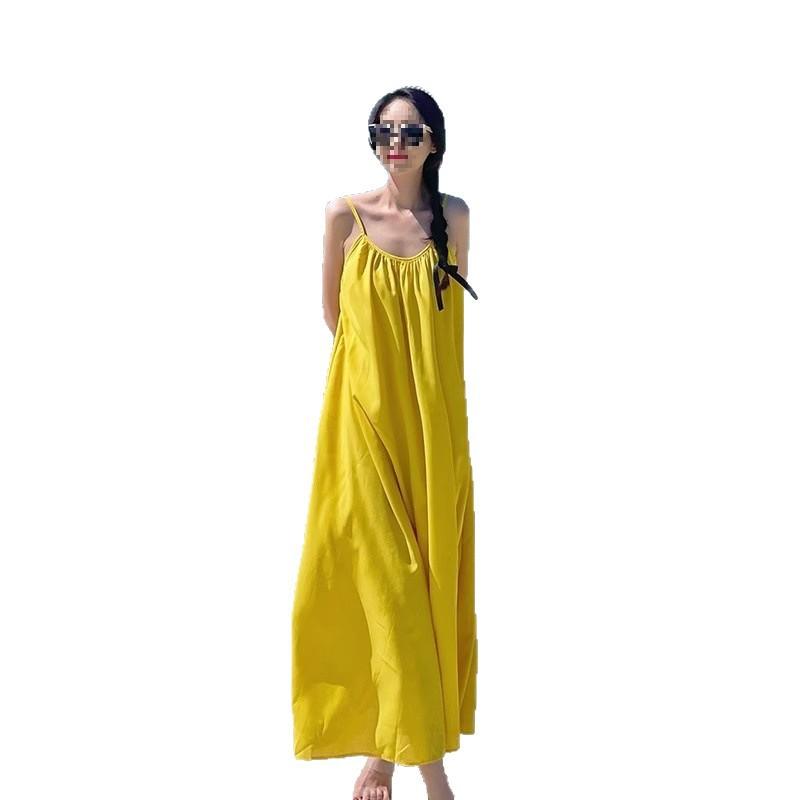 Seaside vacation sexy backless suspender dress women's summer new loose a-word skirt gentle yellow long skirt