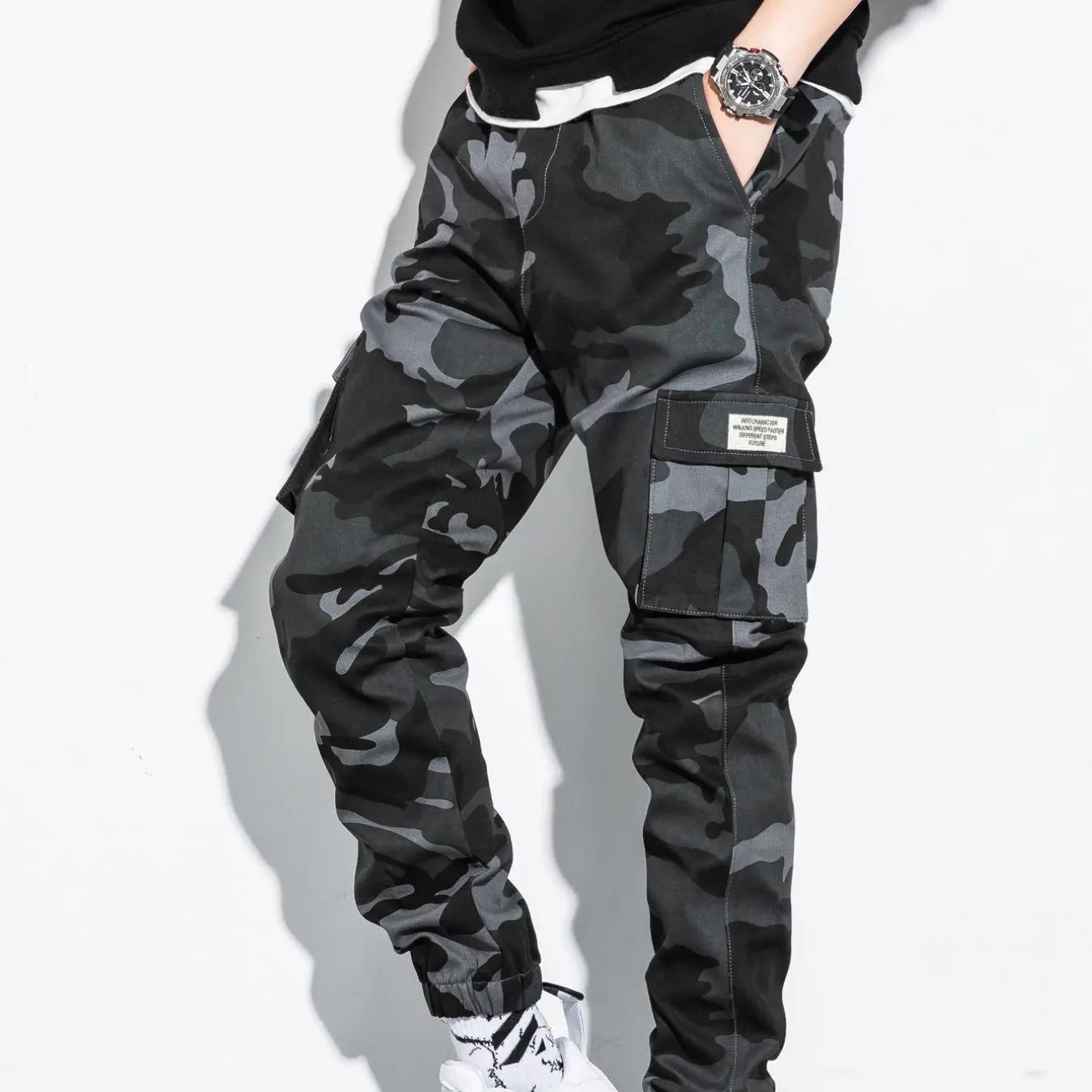 

Чоловічі штани карго з принтом і клапаном PLUS розміру S сірий