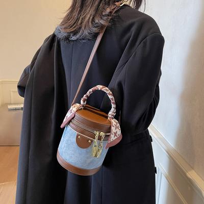 Retro Contrasting Color Bucket Bag Women's 2025 New Niche Design Portable Cylinder Bag Versatile Texture Shoulder Messenger Bag