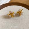 New French Retro Metal Fireworks Pearl Stud Earrings Femininity Light Luxury Versatile Elegant Earrings Wholesale