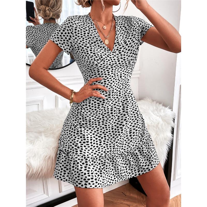 Abito estivo di tendenza europeo e americano sexy con scollo a V profondo e piccolo motivo floreale, elegante, da donna