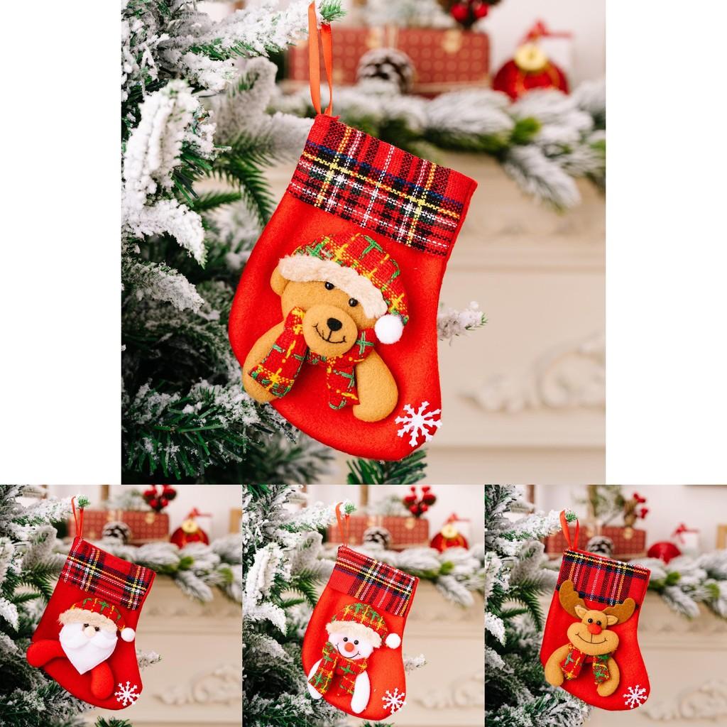 Decorative Red Christmas Stockings With Fun Cartoon Designs Of Santa Snowman Reindeer Bear For Vibrant Celebrations Festive