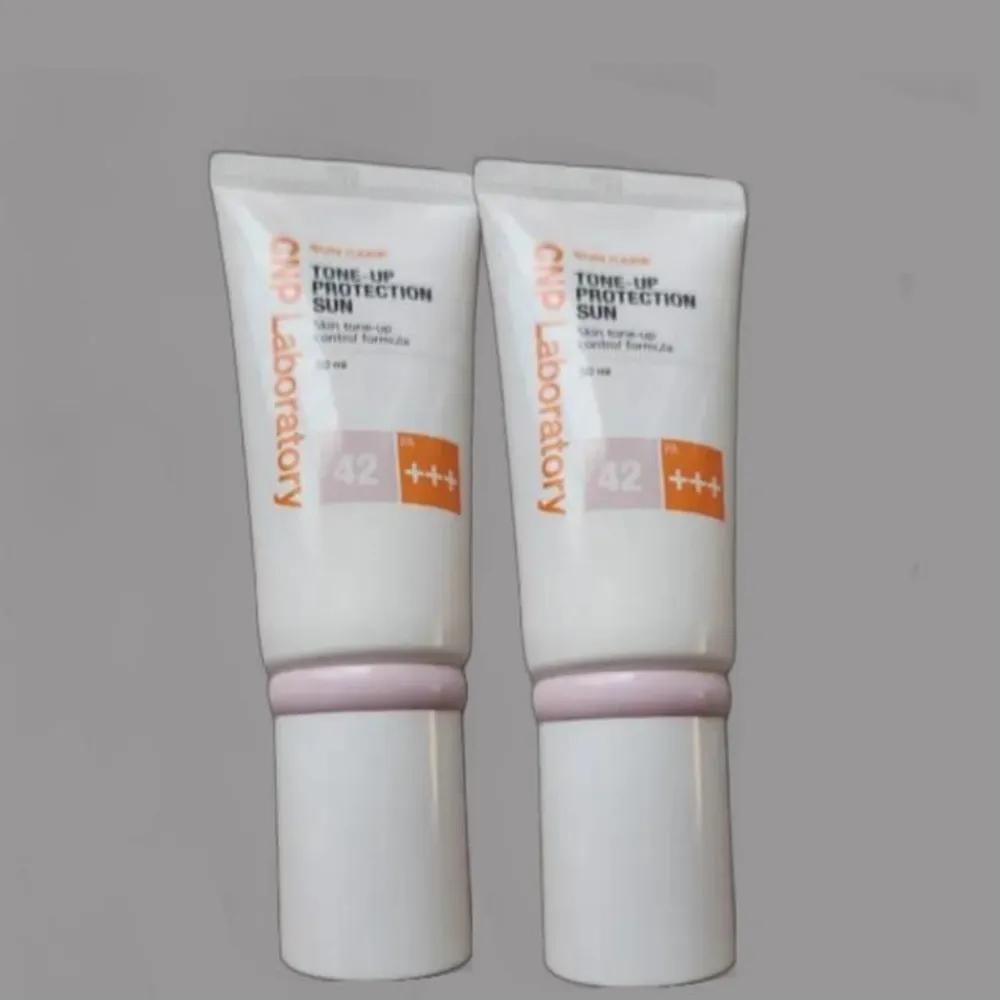 CNP Tone-Up Protection Sun Cream 50ml+50ml Pink Tone-Up