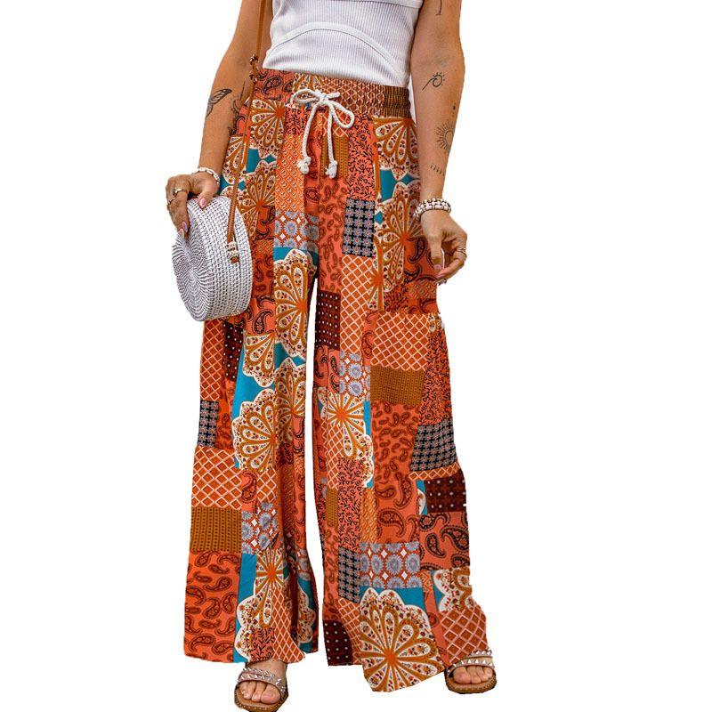 

Принтованные эластичные брюки с завязками на талии Свободные брюки Женские Red S