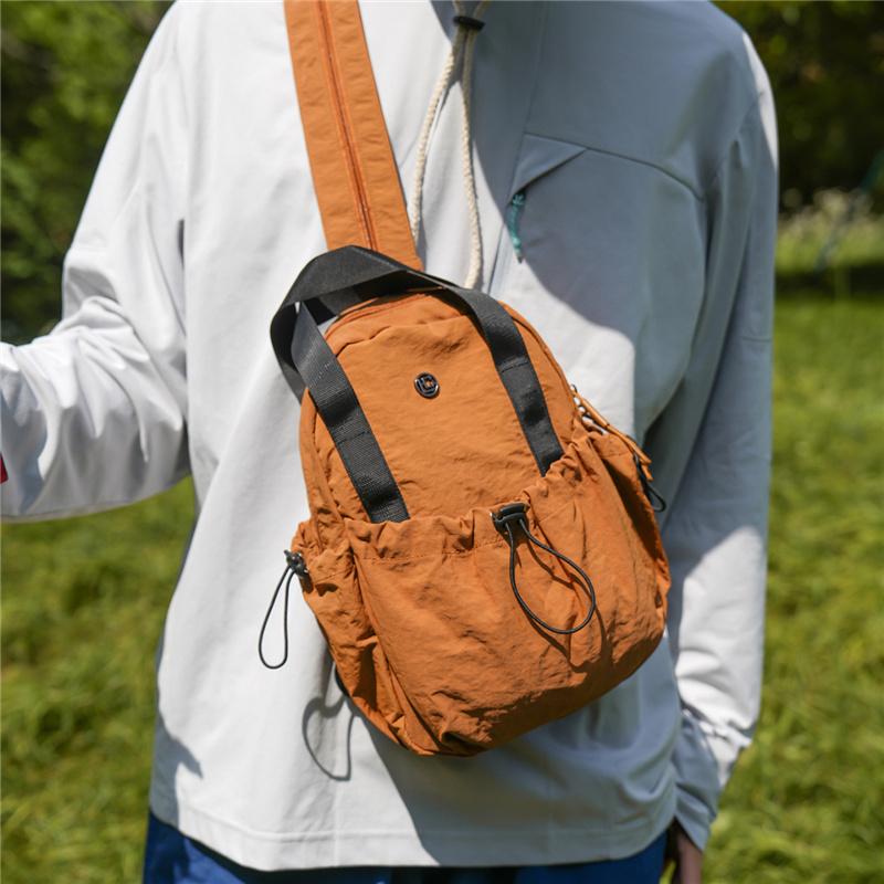 Color Block Backpack with Front Drawstring Pocket and Dual Carrying Options
