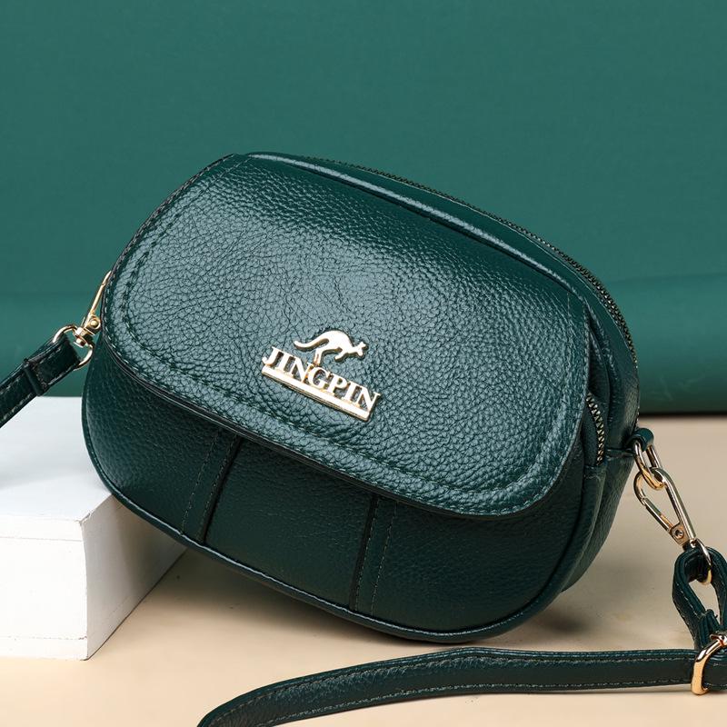 

Модна жіноча сумка кросбоді на плече з м якої шкіри великої місткості та малої ваги червоний