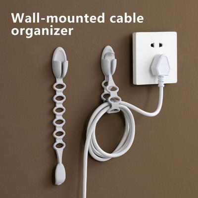 An der Wand montierter Kabel-Organizer mit dehnbaren Silikon-Klebebändern zum Ordnen von Kabeln für eine Vielzahl von Küchengeräten