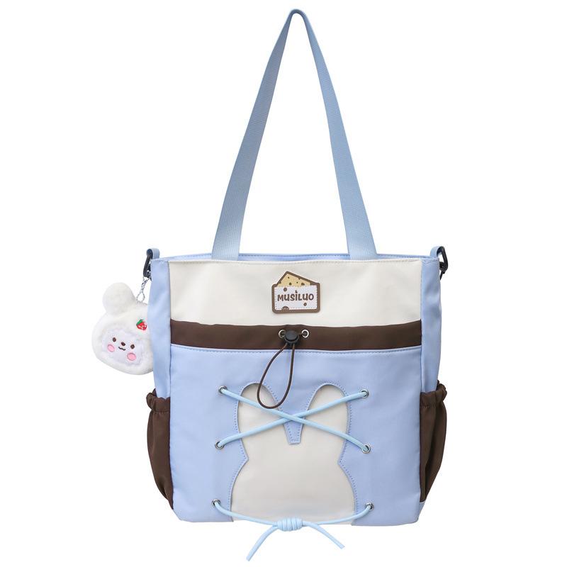 

Korean version of fashion student messenger bag women s versatile contrasting shoulder bag large capacity junior high school portable make-up bag single package синій